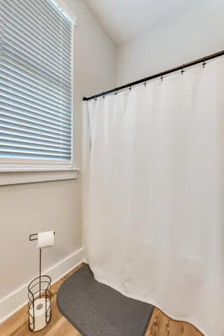 an aerial view of a house with a garden