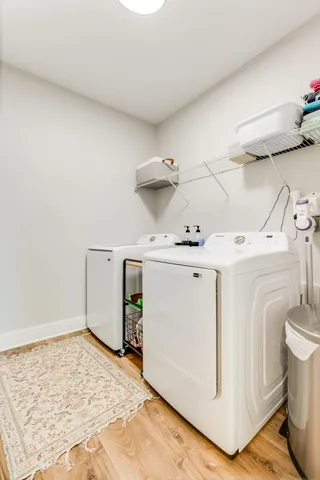 an aerial view of a house with a swimming pool