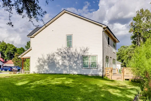 a view of balcony with wooden floor