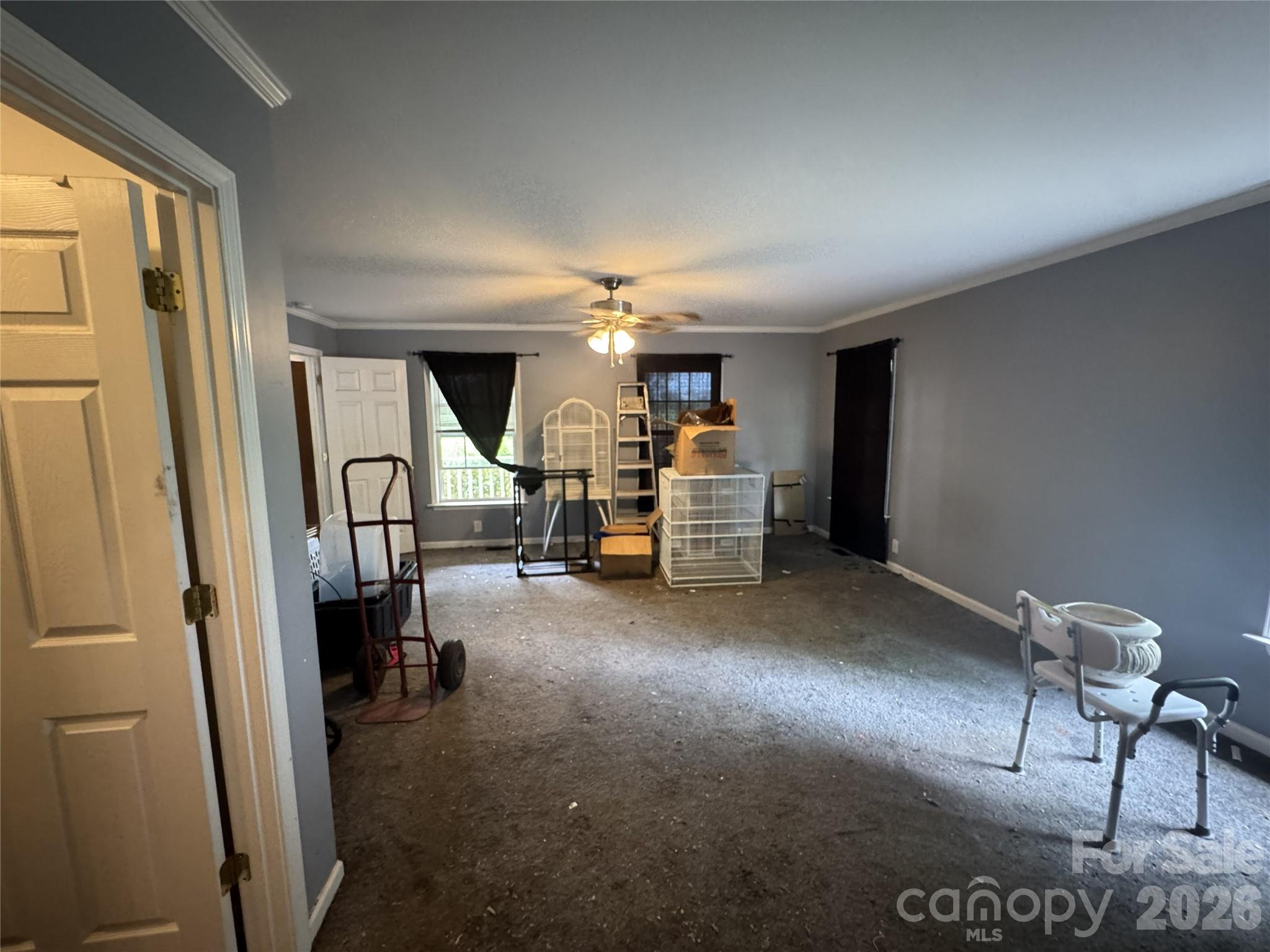 8441 Shelley Mullis Road Fort Mill, SC 29707 - Photo 8 of 23 a view of a livingroom with furniture and staircase