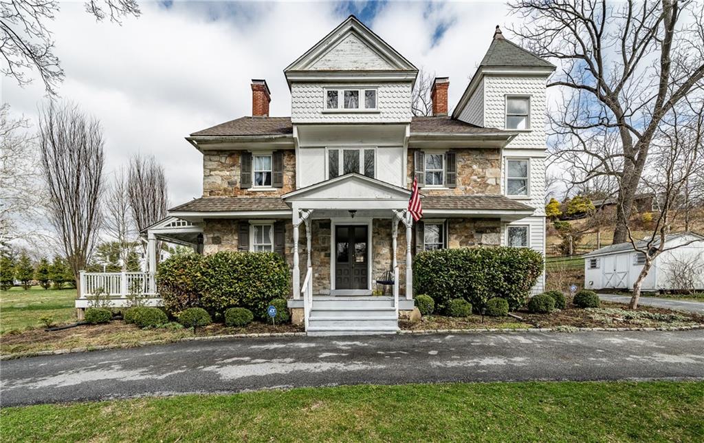 701 Oakbourne Road West Chester, PA 19382 - Photo 1 of 50 a front view of a house