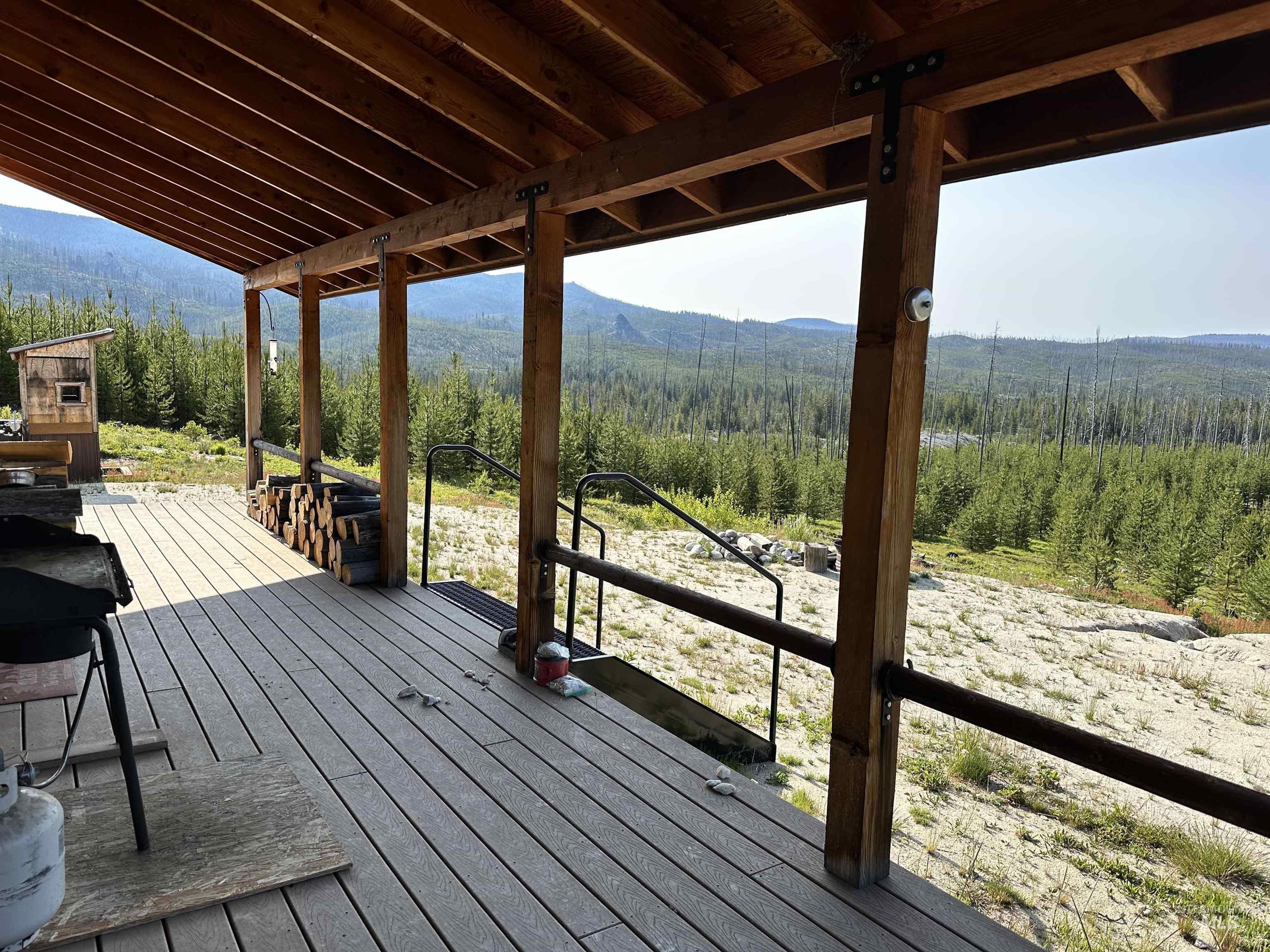 532 Warren Creek Road McCall, ID 83638 - Photo 4 of 45 Deck featuring a mountain view and a forest view