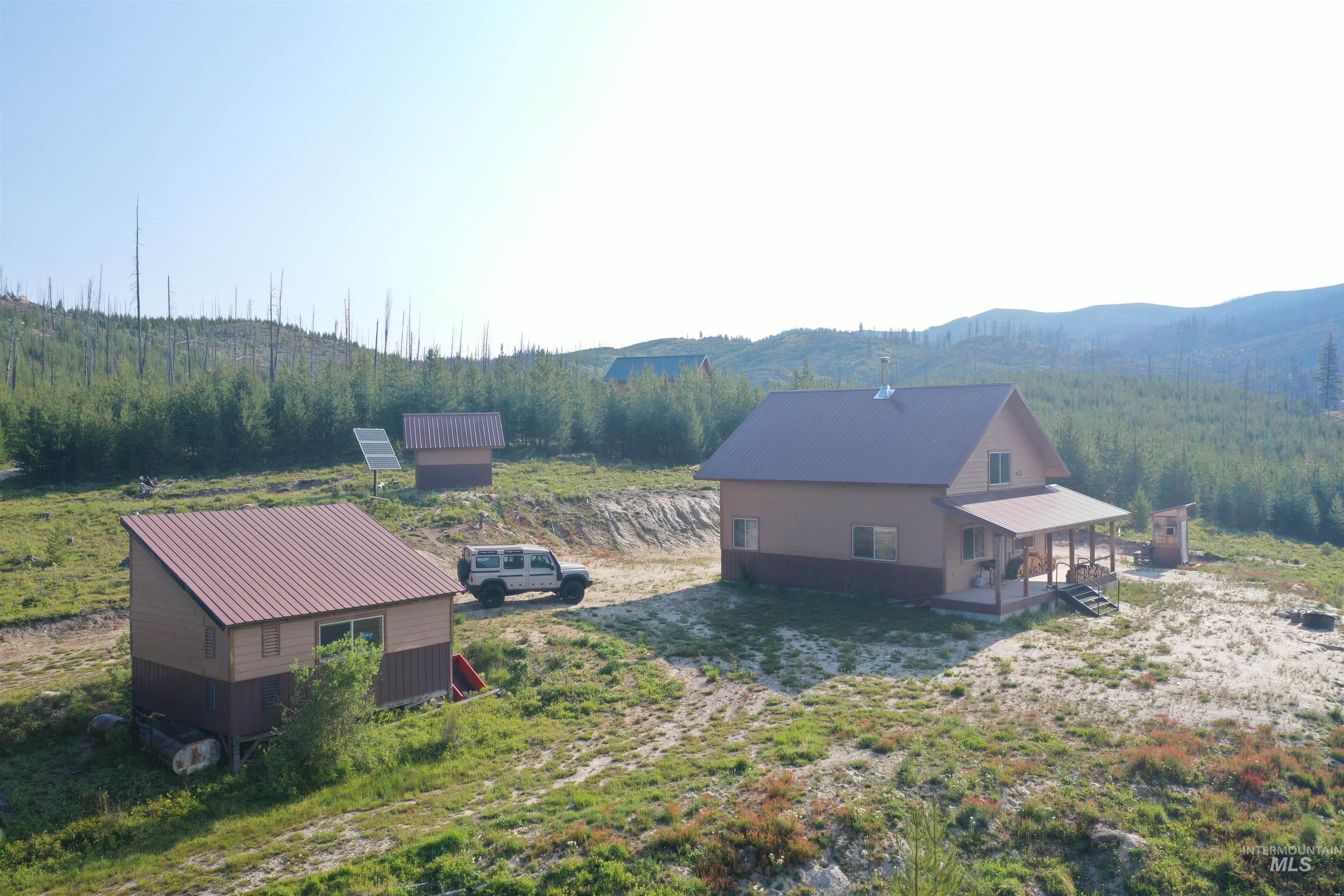 532 Warren Creek Road McCall, ID 83638 - Photo 41 of 45 View from above of property with a mountainous background and a forest