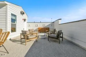 a building outdoor space with patio furniture