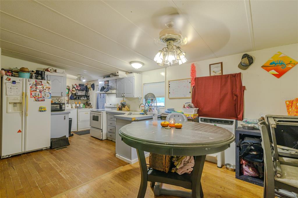 4225 Southwest 178th Terrace Dunnellon, FL 34432 - Photo 20 of 49 a view of kitchen and dining area with furniture