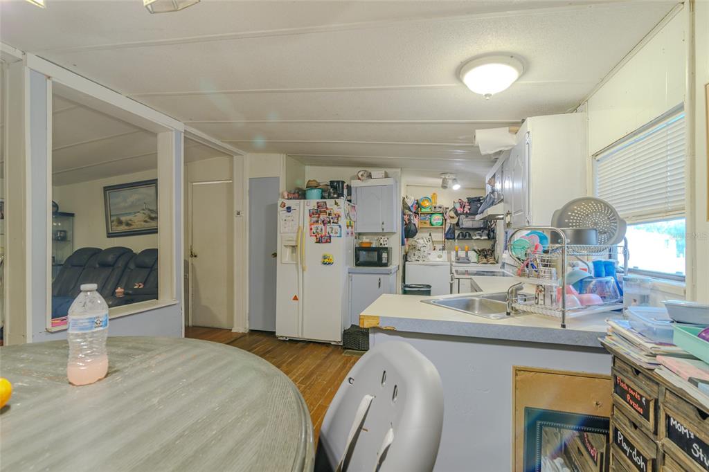 4225 Southwest 178th Terrace Dunnellon, FL 34432 - Photo 21 of 49 a kitchen with stainless steel appliances granite countertop a sink and cabinets