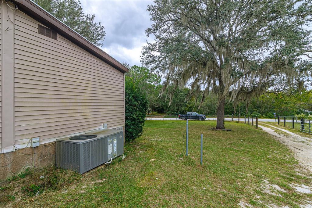 4225 Southwest 178th Terrace Dunnellon, FL 34432 - Photo 10 of 49 a view of a backyard with a garden