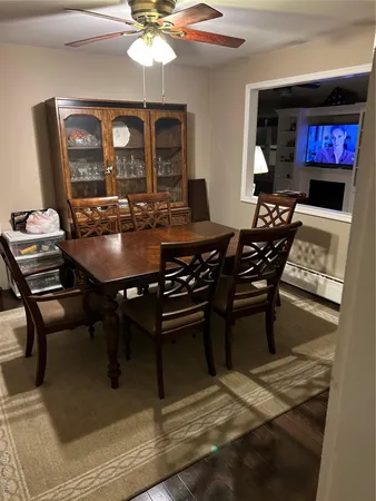 a view of a dining room with furniture