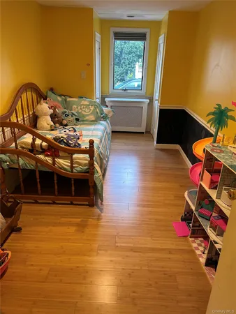 a bedroom with furniture and a bed