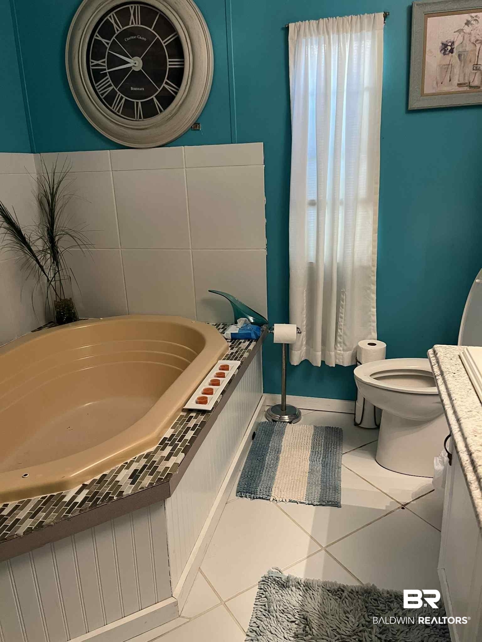 15418 Pine Grove Road Bay Minette, AL 36507 - Photo 12 of 18 Full bathroom featuring light tile patterned floors, a bath, and vanity