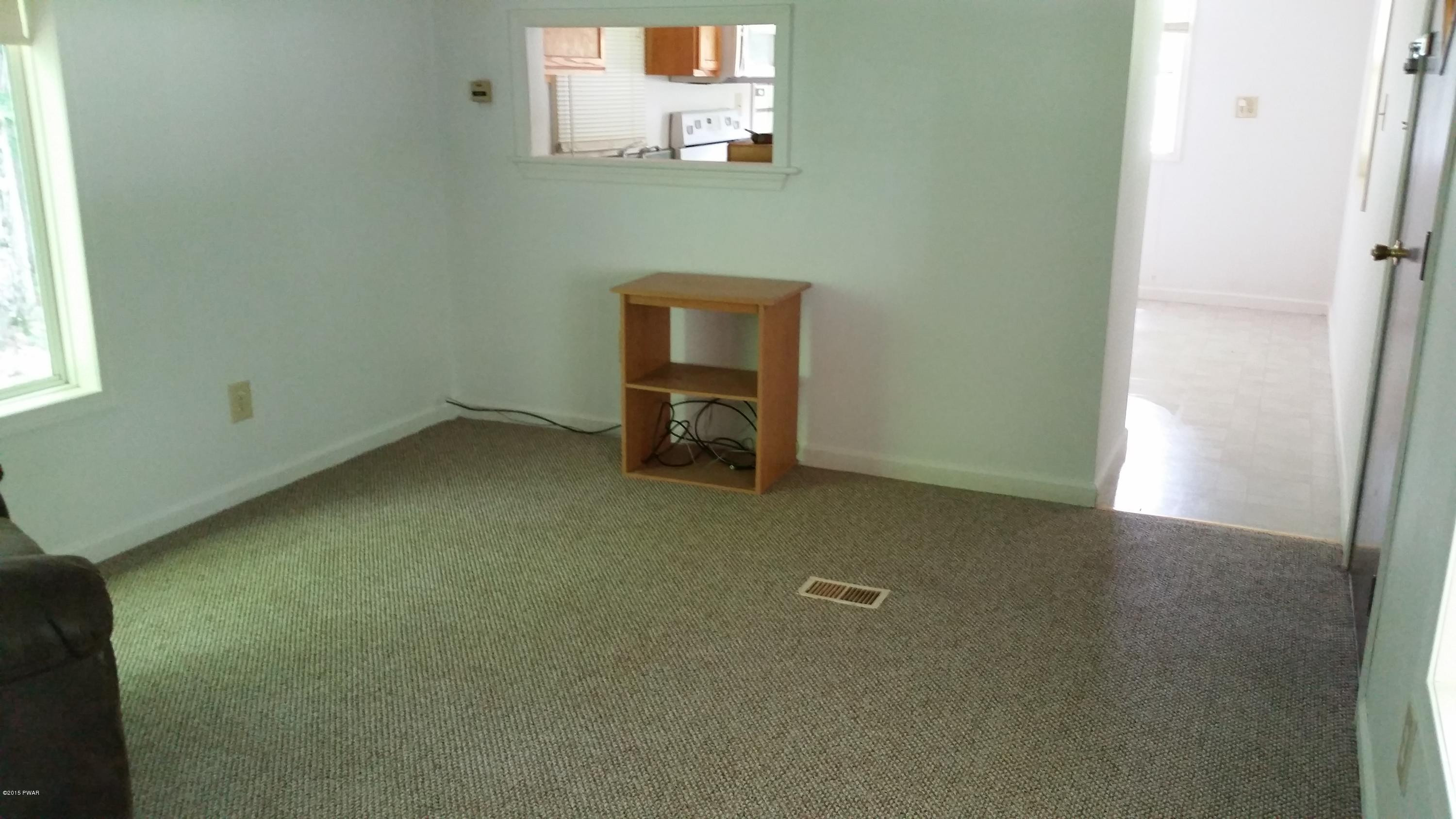 479 Roemerville Road Greentown, PA 18426 - Photo 4 of 30 an empty room with a window