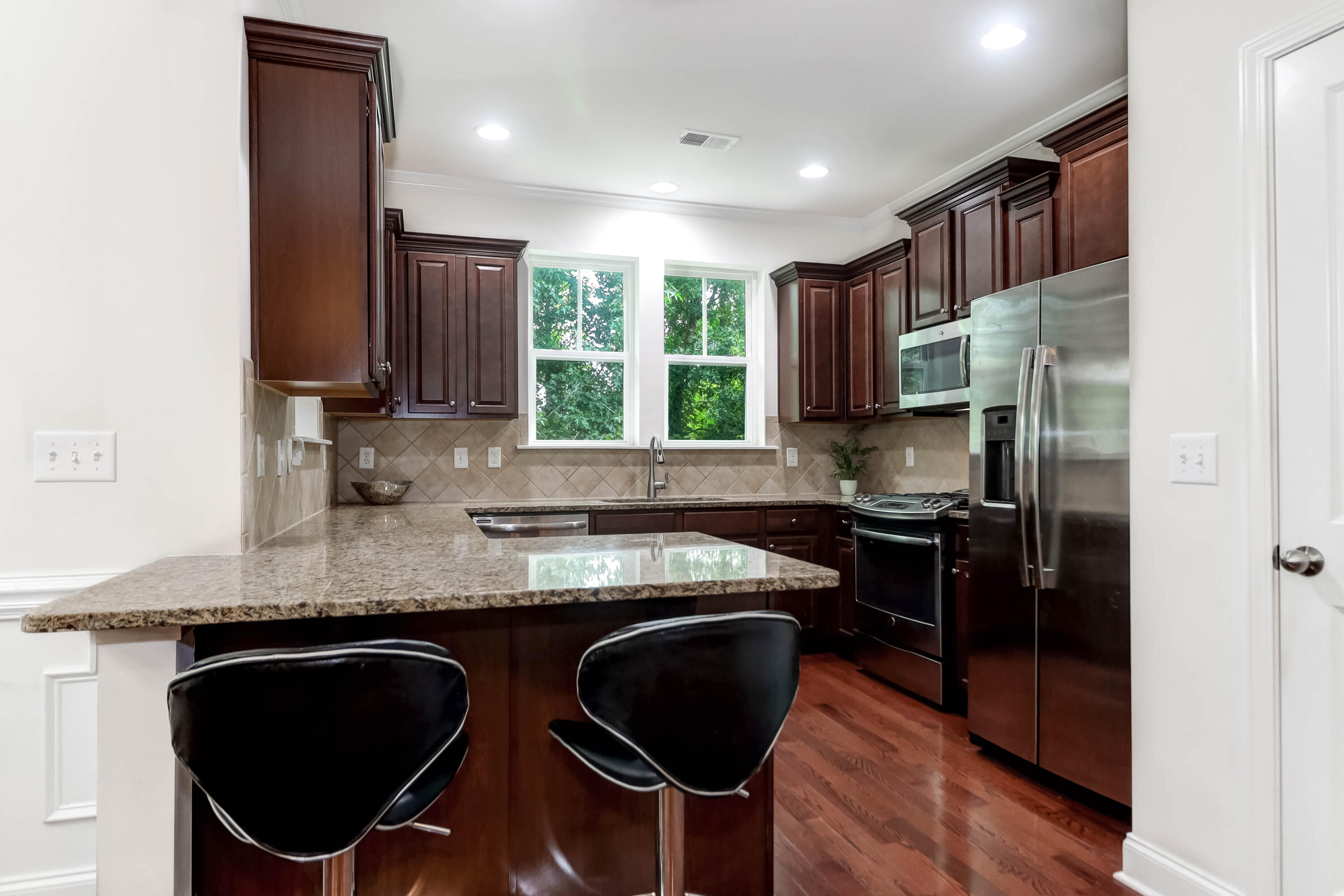 1244 Dingle Road Mount Pleasant, SC 29466 - Photo 16 of 31 Kitchen 2 Stainless, granite, tiled back