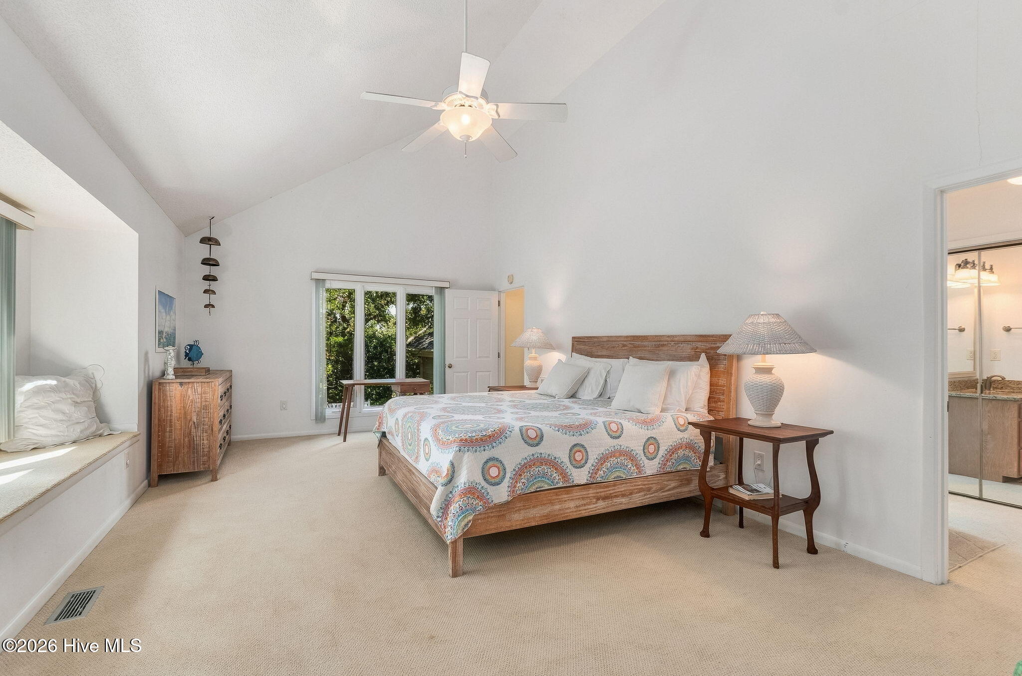 579 Coral Ridge Road Pine Knoll Shores, NC 28512 - Photo 21 of 67 Primary bedroom