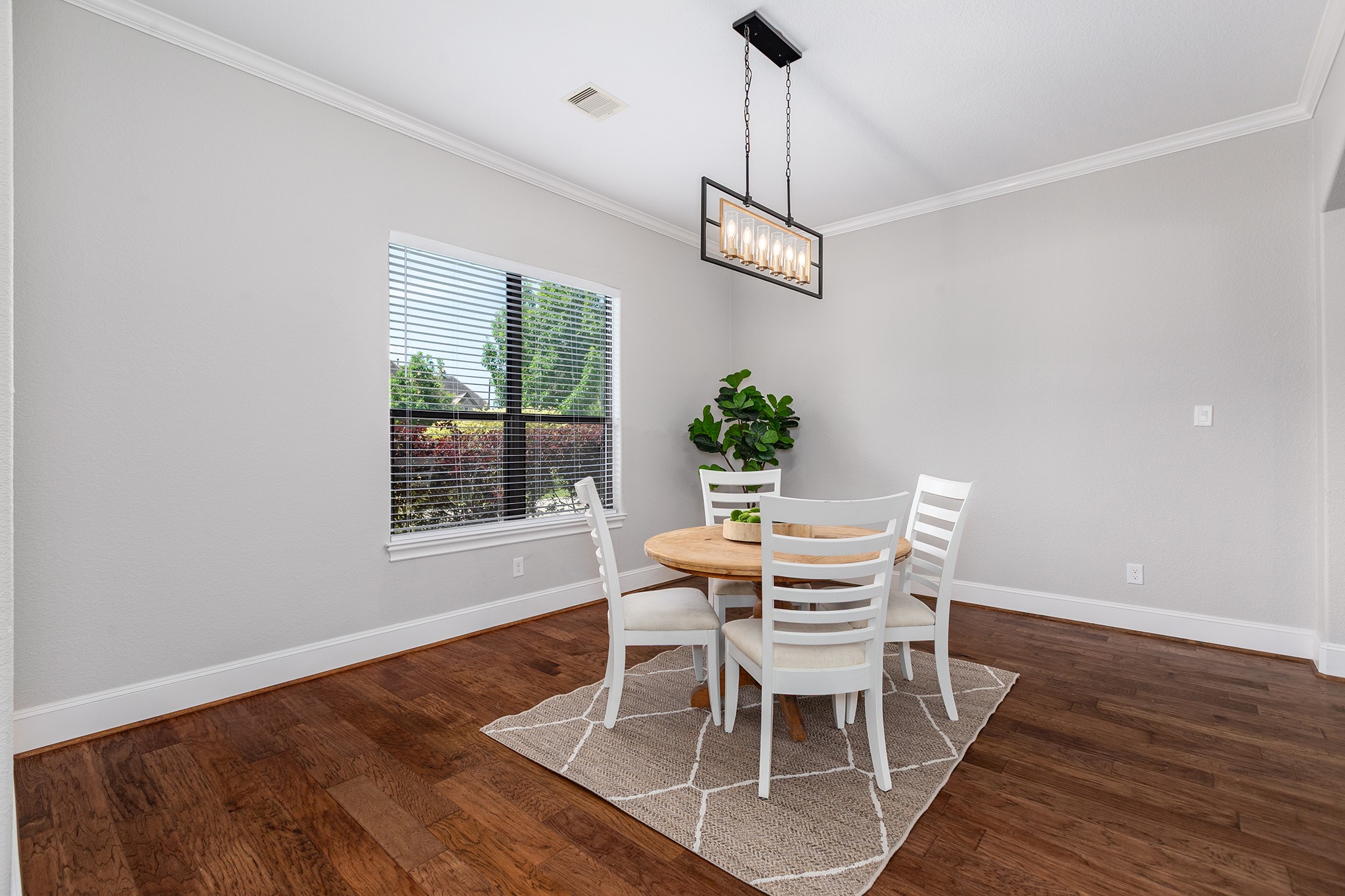 5507 Bright Timber Landing Drive Spring, TX 77386 - Photo 8 of 45 Bright and airy formal dining with updated fixture