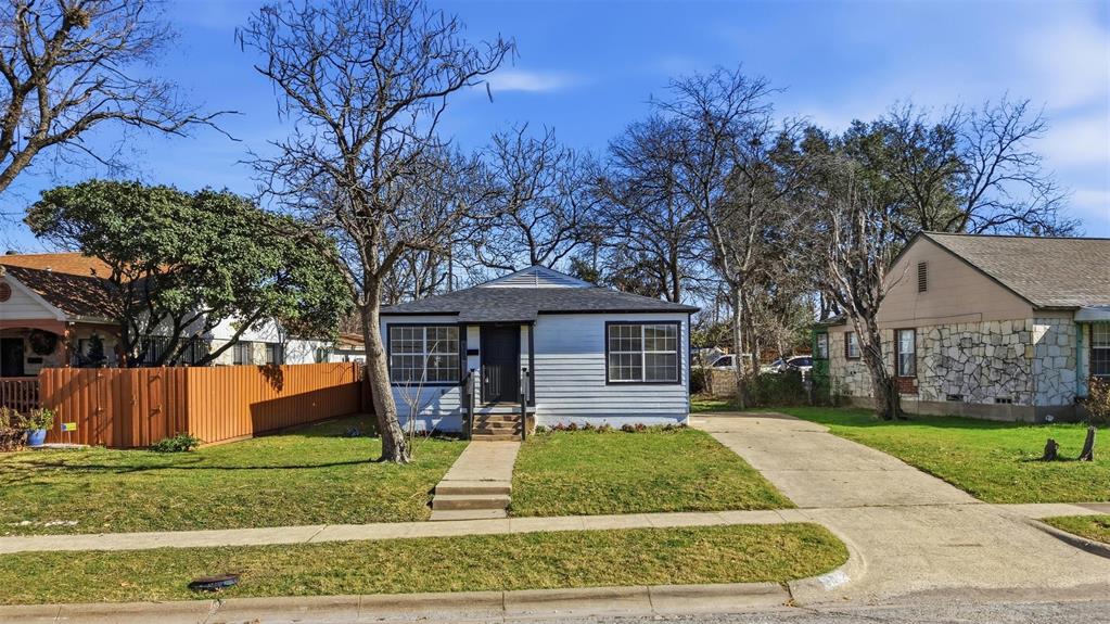 2012 Tennessee Avenue Dallas, TX 75224 - Photo 2 of 28 front view of a house with a yard