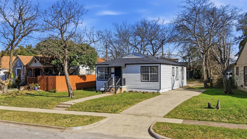 2012 Tennessee Avenue Dallas, TX 75224 - Photo 4 of 28 a front view of a house with garden