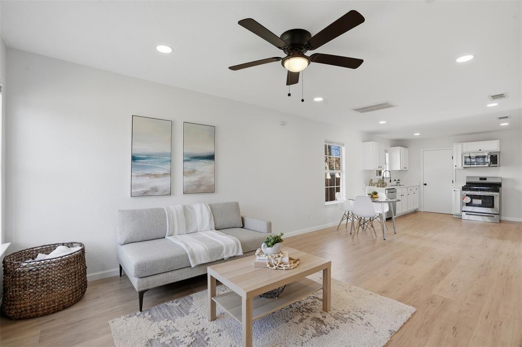 2012 Tennessee Avenue Dallas, TX 75224 - Photo 6 of 28 a living room with furniture and a large window