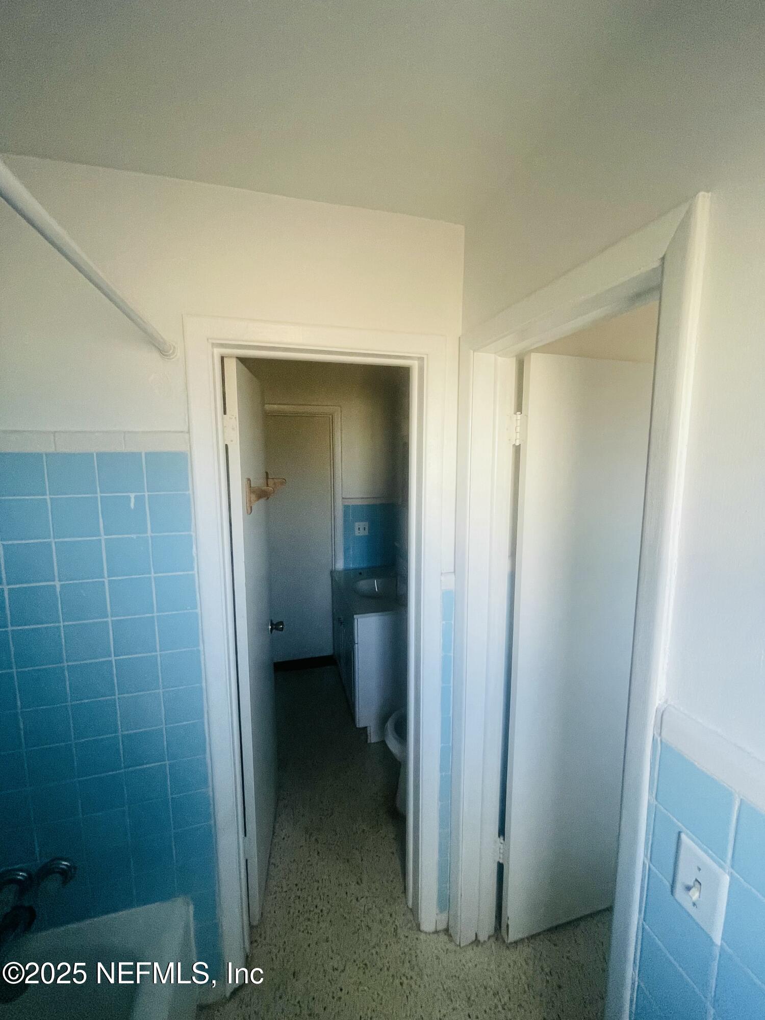 6643 Heidi Road Jacksonville, FL 32277 - Photo 32 of 45 a bathroom with a sink and a toilet