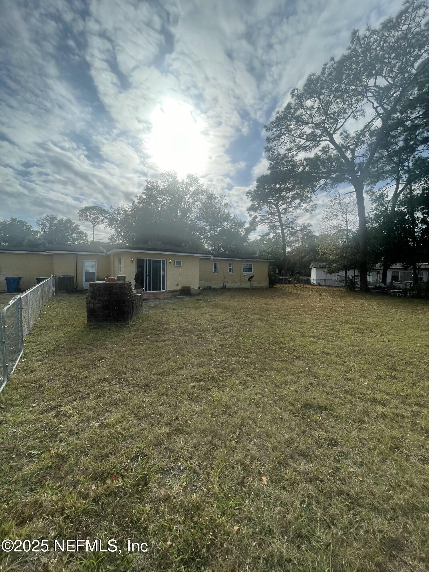 6643 Heidi Road Jacksonville, FL 32277 - Photo 41 of 45 a view of a yard with an outdoor space