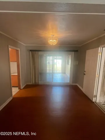 a kitchen with stainless steel appliances granite countertop a refrigerator and a stove