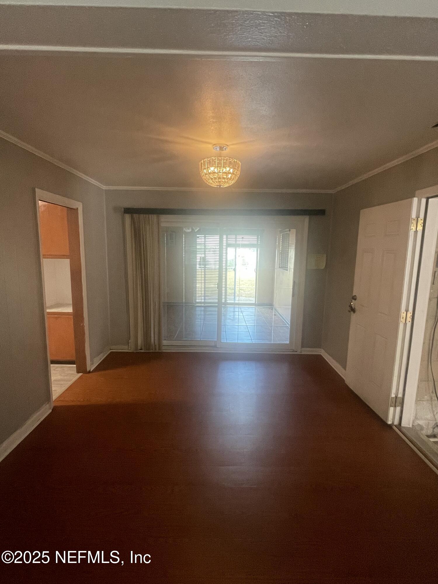 6643 Heidi Road Jacksonville, FL 32277 - Photo 9 of 45 an empty room with windows and closet