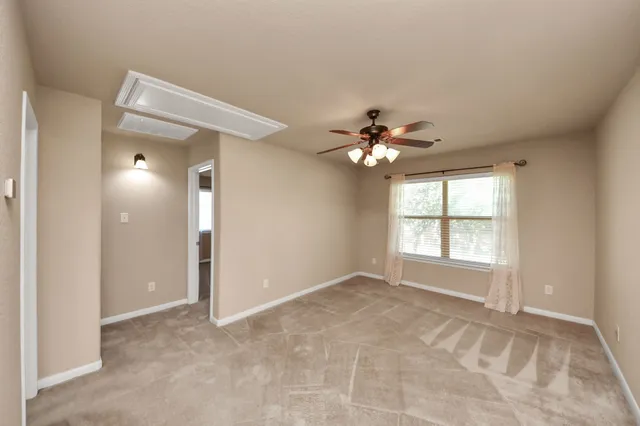 a view of a backyard with flat screen tv