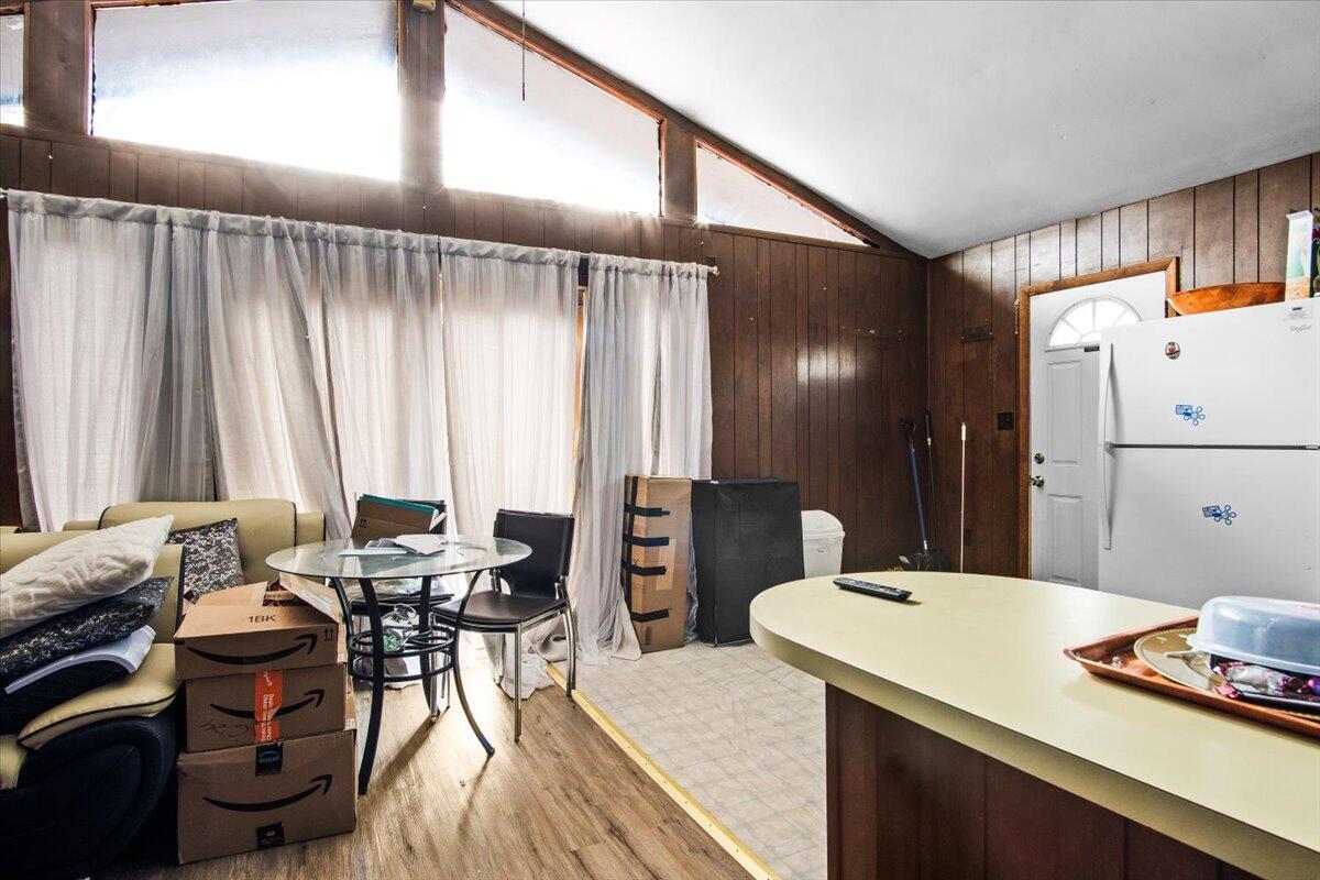3 Property Package Tobyhanna, PA 18466 - Photo 17 of 25 a kitchen with a table chairs and a refrigerator