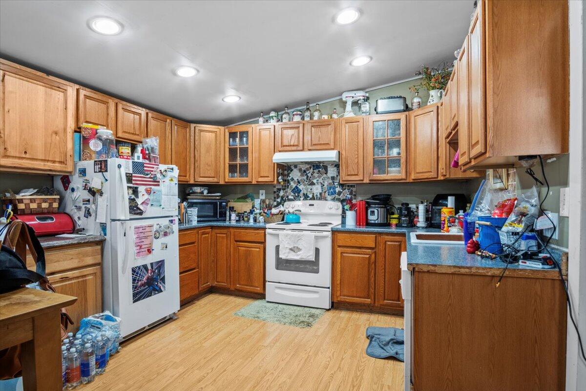 3 Property Package Tobyhanna, PA 18466 - Photo 2 of 25 a kitchen with stainless steel appliances granite countertop a refrigerator sink stove microwave and cabinets