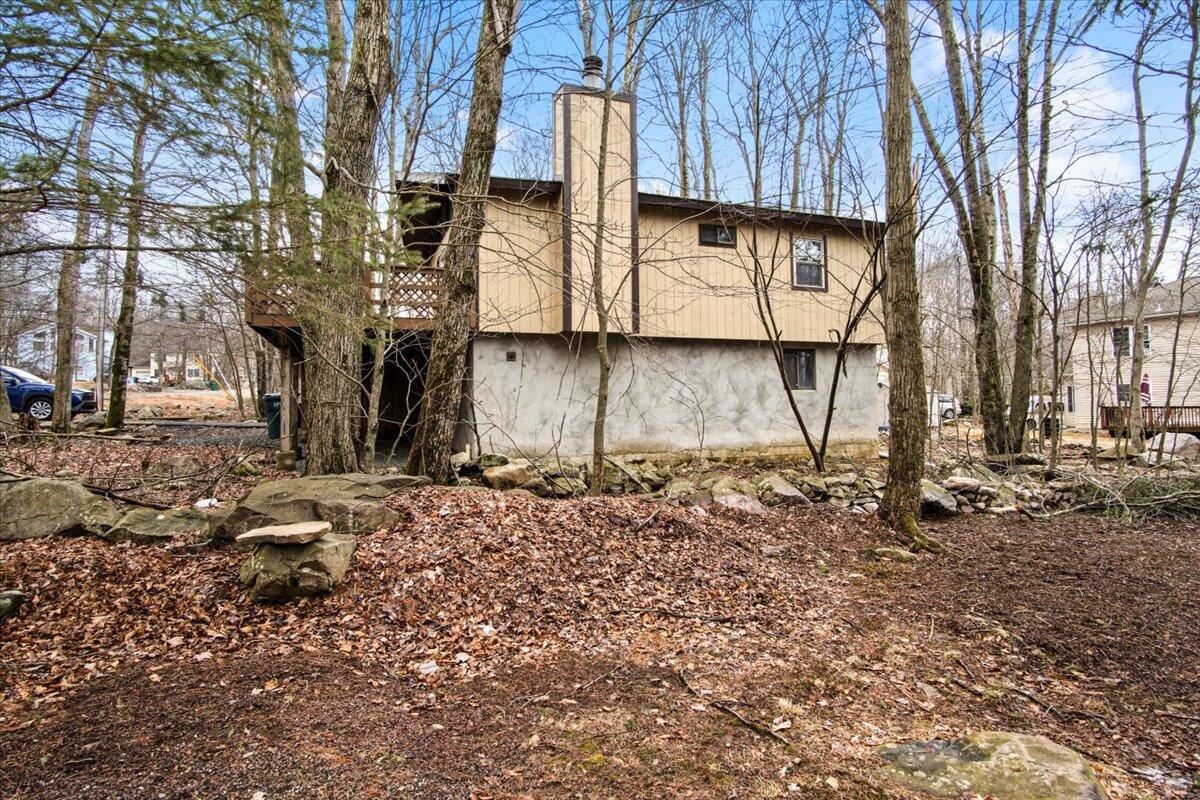 3 Property Package Tobyhanna, PA 18466 - Photo 22 of 25 a view of a house with a yard covered in snow