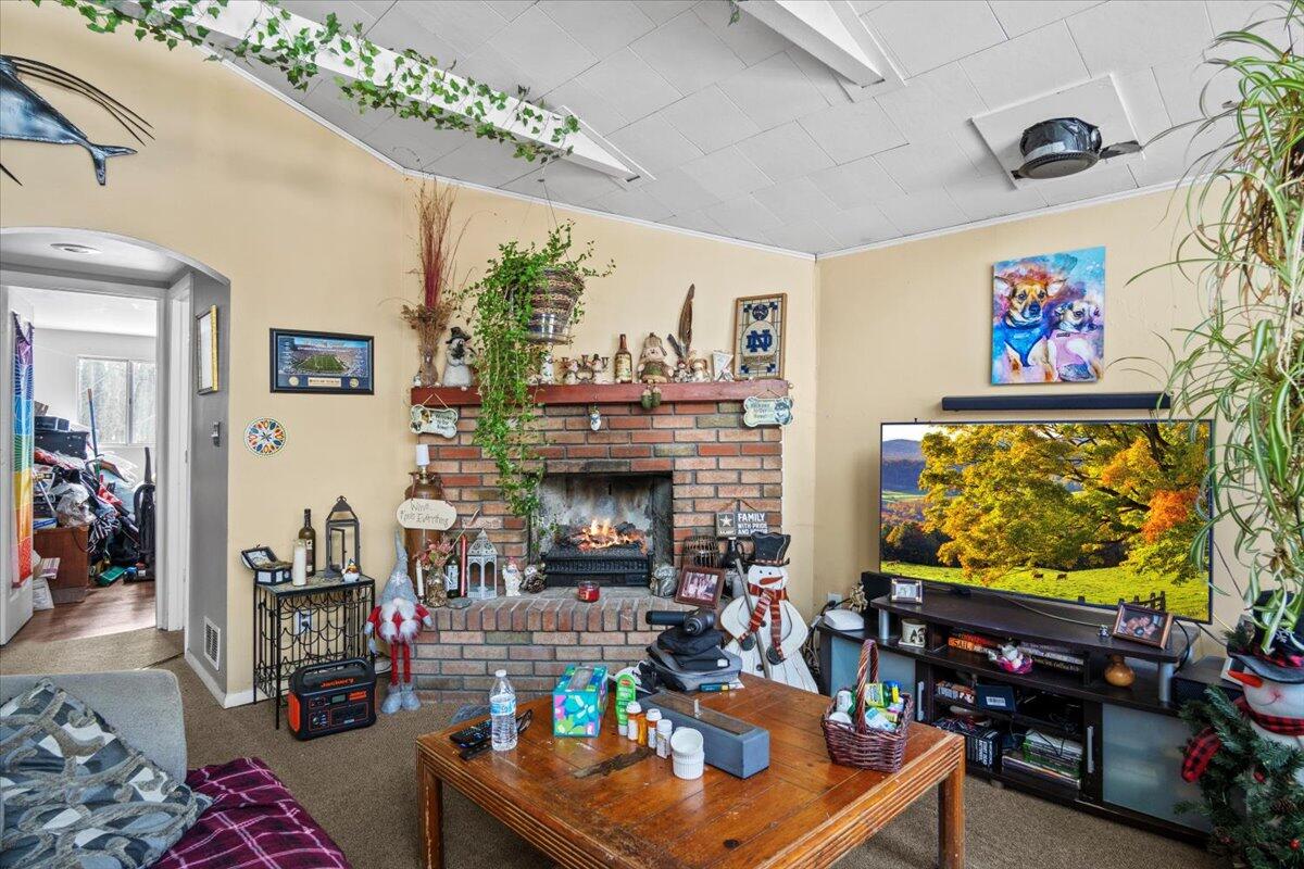 3 Property Package Tobyhanna, PA 18466 - Photo 3 of 25 a living room with fireplace furniture and a flat screen tv