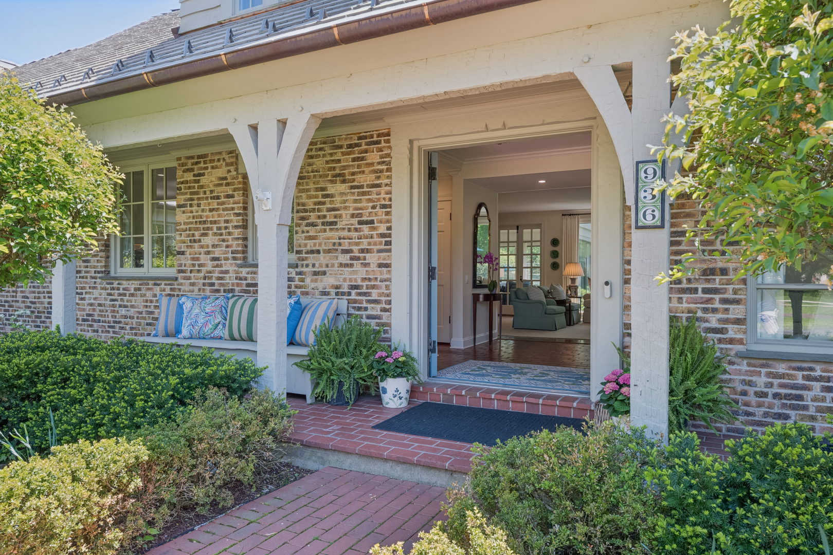936 Sunset Road Winnetka, IL 60093 - Photo 4 of 50 front view of a house with potted plants