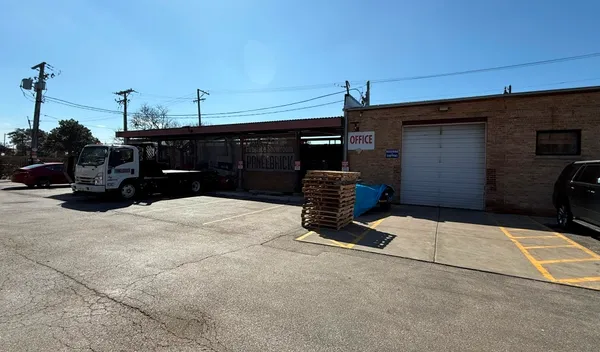 a view of street with parked cars