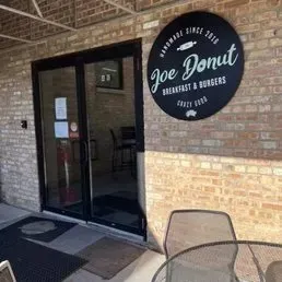 a view of a door with a bench