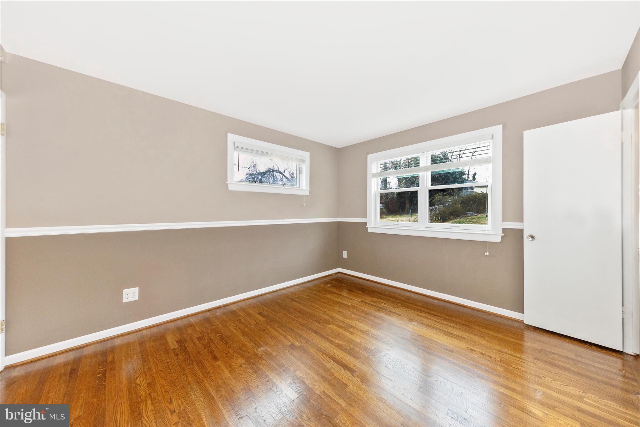 11802 Pittson Road Silver Spring, MD 20906 - Photo 19 of 50 a view of a room with wooden floor and window