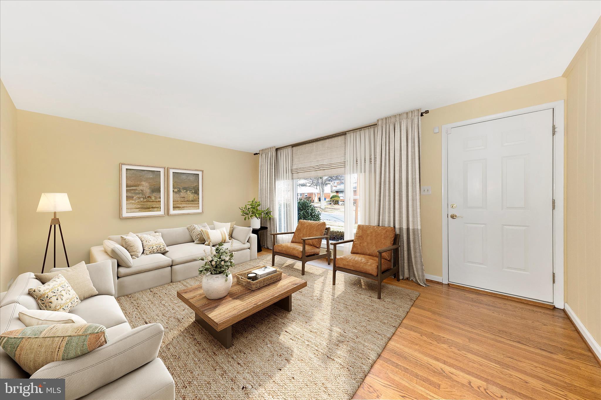 11802 Pittson Road Silver Spring, MD 20906 - Photo 2 of 50 a living room with furniture and a window