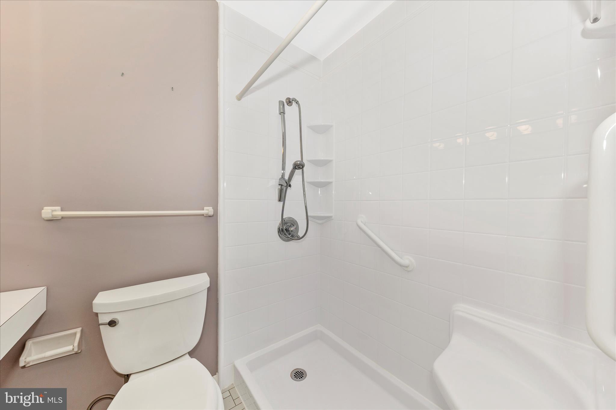 11802 Pittson Road Silver Spring, MD 20906 - Photo 32 of 50 a bathroom with a toilet and a shower