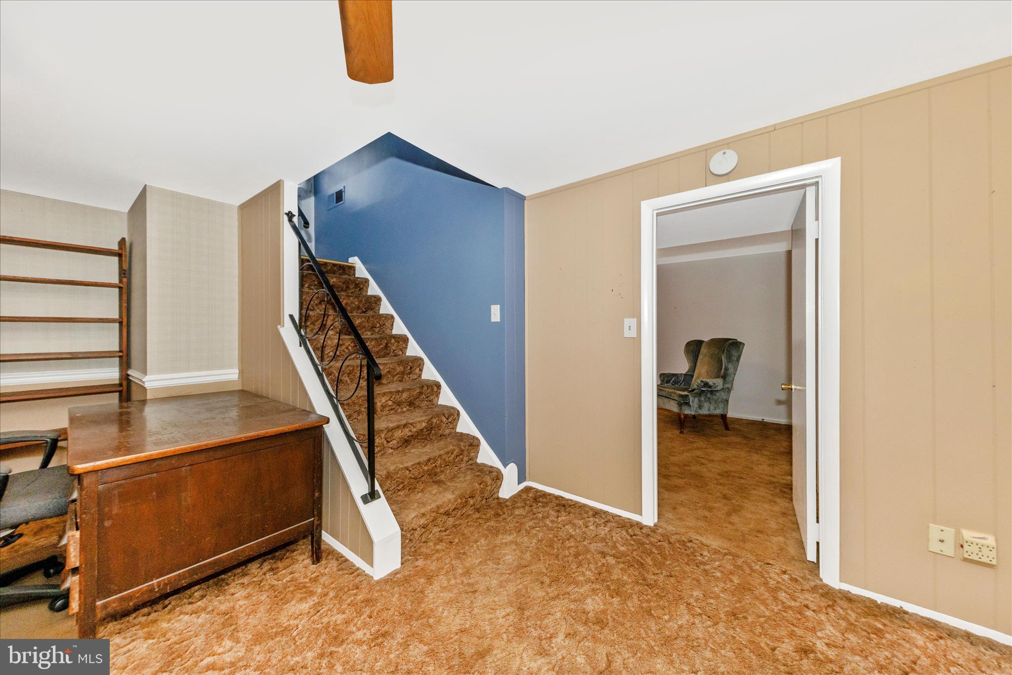 11802 Pittson Road Silver Spring, MD 20906 - Photo 33 of 50 a view of a room with wooden floor and stairs