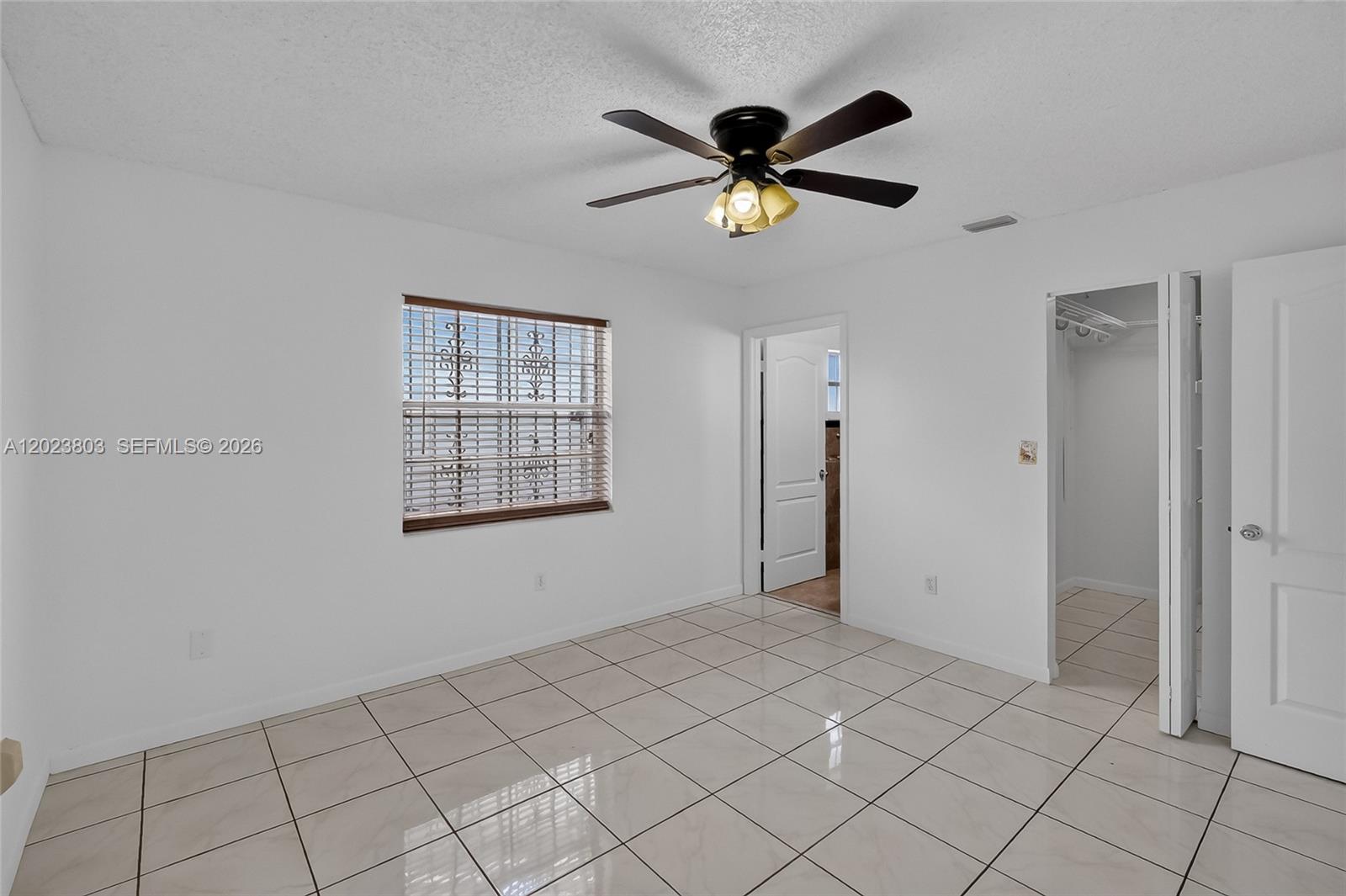 2514 West 74th Street Hialeah, FL 33016 - Photo 18 of 26 master bedroom with walk in closet