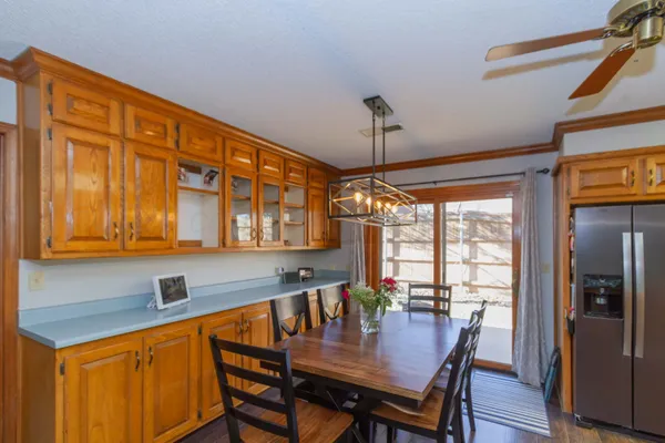 a dining room with furniture and window