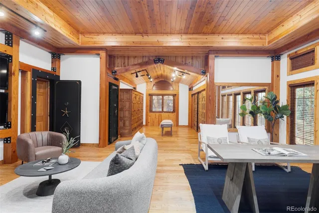 a bedroom with furniture and a fireplace