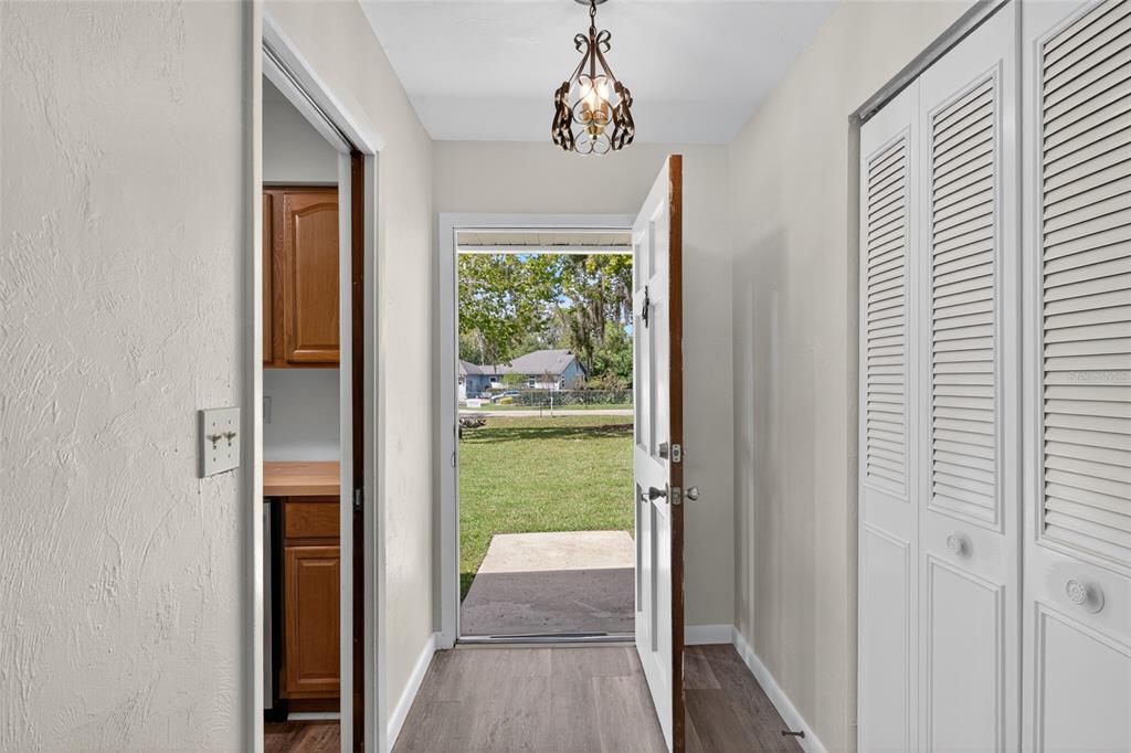 6401 Southwest 78th Street Gainesville, FL 32608 - Photo 4 of 29 a view of a hallway with a dining room