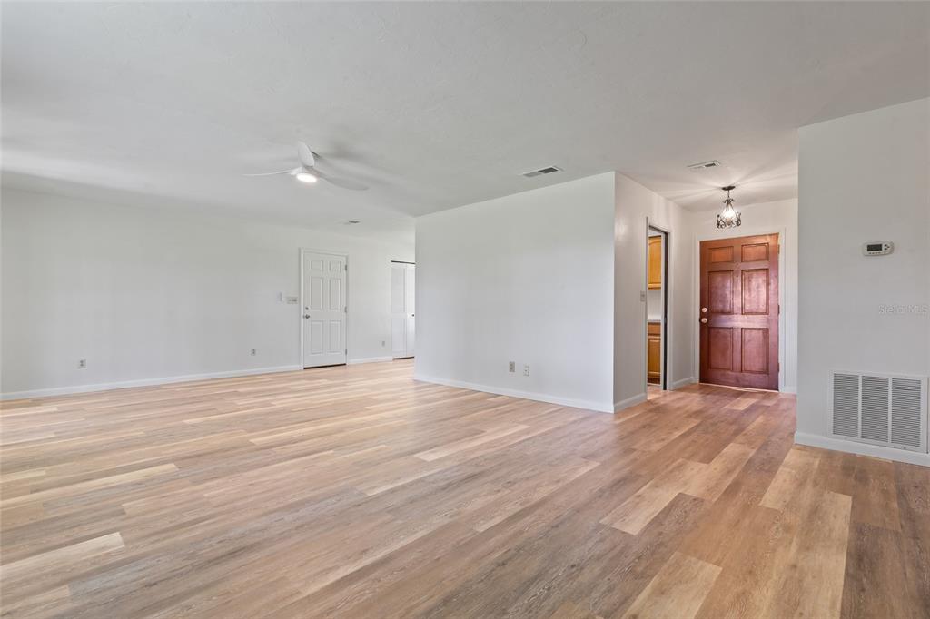 6401 Southwest 78th Street Gainesville, FL 32608 - Photo 9 of 29 a view of empty room with wooden floor