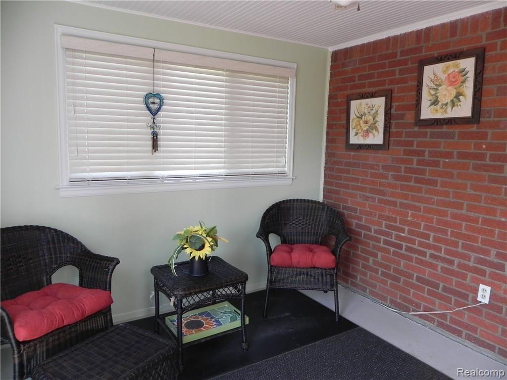 1297 East Maple Road Birmingham, MI 48009 - Photo 15 of 32 SUNROOM OFF KITCHEN * LEADS TO DECK