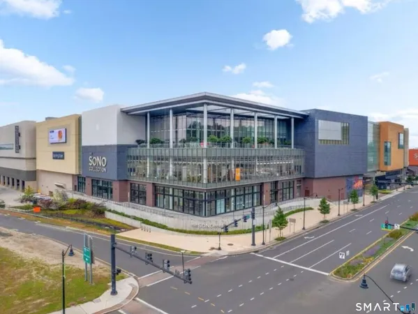 a view of a chairs and table in the patio