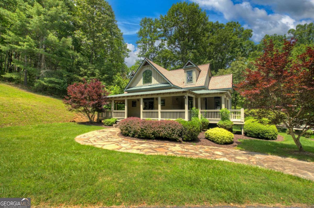 Lot 141 Fox Ridge, Unit 141 Blairsville, GA 30512 - Photo 31 of 31 a front view of a house with a garden