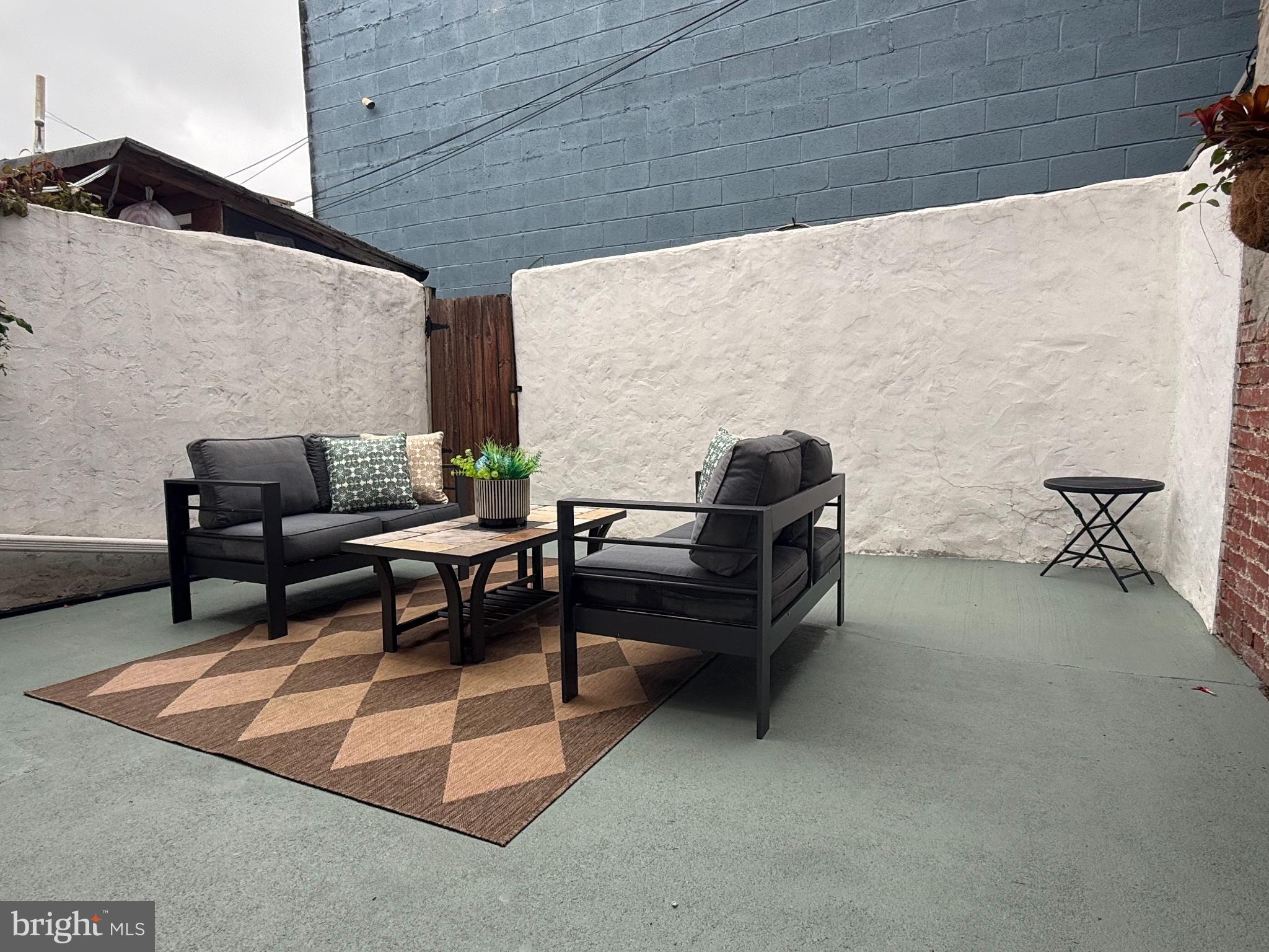 503 S Street Northwest Washington, DC 20001 - Photo 31 of 36 Charming outdoor retreat with cozy seating.