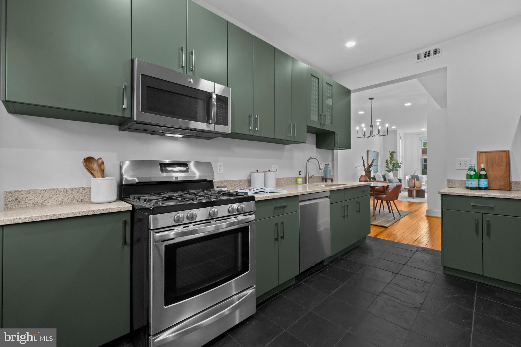 503 S Street Northwest Washington, DC 20001 - Photo 8 of 36 Modern kitchen with stylish green cabinetry.