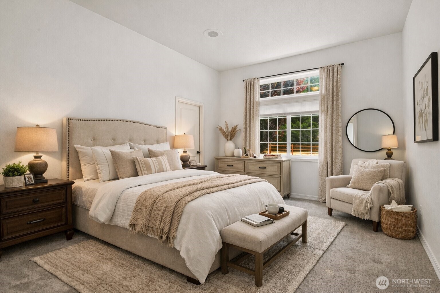 9609 346th Street South Roy, WA 98580 - Photo 15 of 31 a spacious bedroom with a bed couch and window