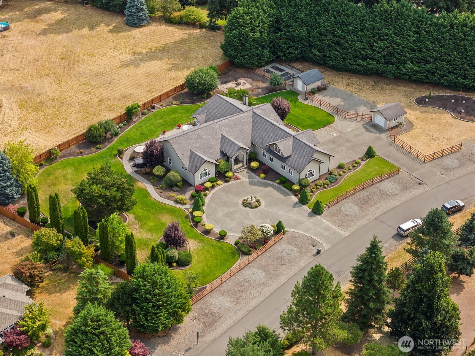 9609 346th Street South Roy, WA 98580 - Photo 2 of 31 an aerial view of house with yard swimming pool and outdoor seating