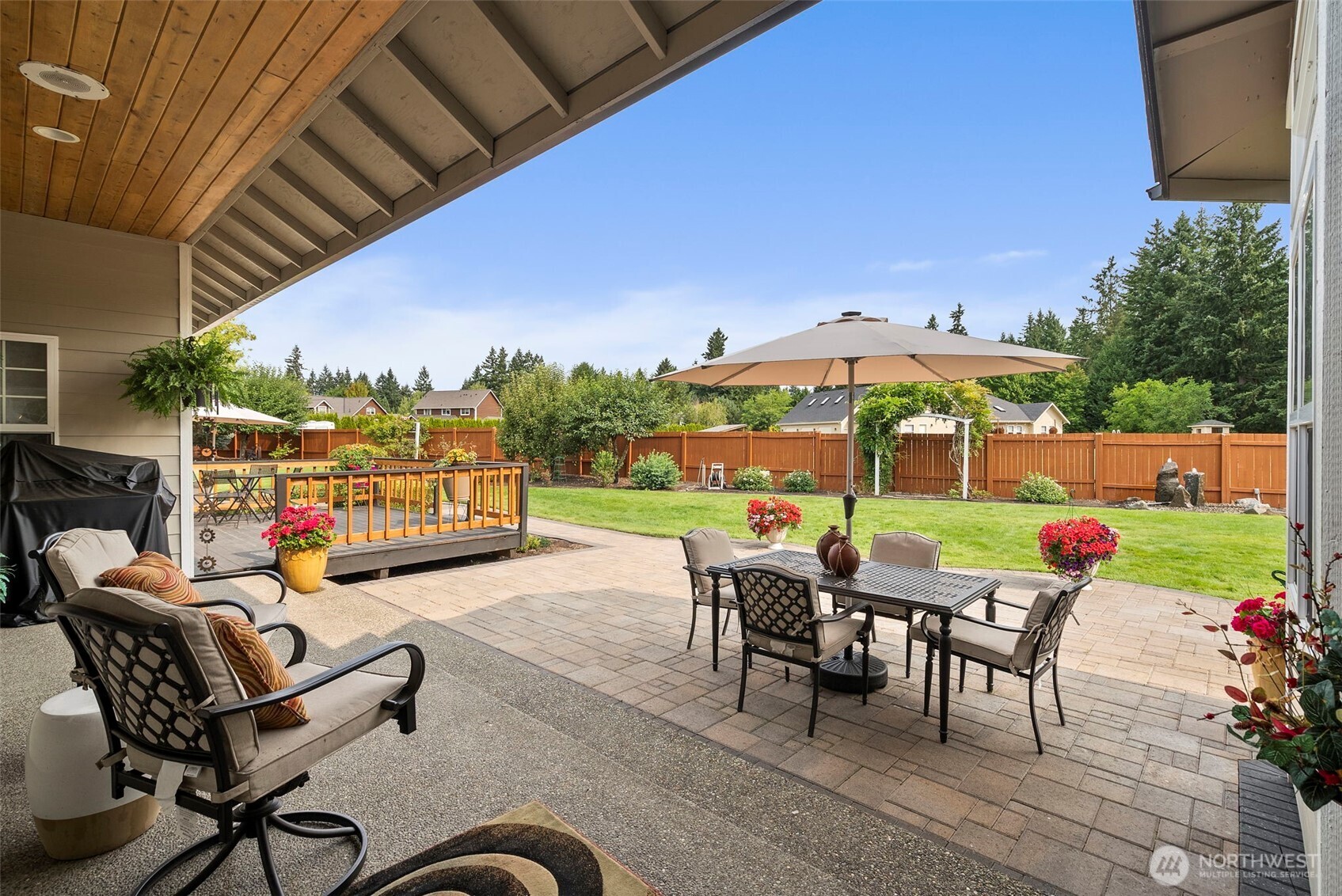 9609 346th Street South Roy, WA 98580 - Photo 30 of 37 a view of a backyard with sitting area and furniture